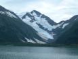 Dramatic glaciers tower over port townships