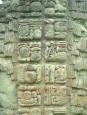 Mayan hieroglyphs carved in stone stela at Copn