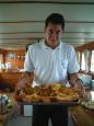 The tough life at sea: Richard serves up a lunch of
fresh slipper lobsters roasted with garlic