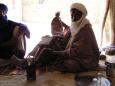 A Tuareg elder prepares tea, before business commences
