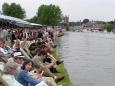 An expectant crowd on the Thames awaits the action