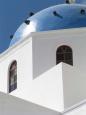 One of the many trademark blue-domed churches on Santorini