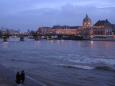 Strolling along the Left Bank as evening falls