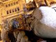 A Parisian cathedral and sculpture by night