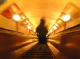 Keiko descends an endless escalator into the bowels of the Moscow Metro