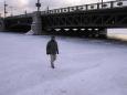 Gingerly testing the thickness of the ice of the River Neva