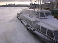 Tour boat and ice fisherman, Neva River